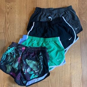 4 girls Nike athletic shorts size medium good condition!